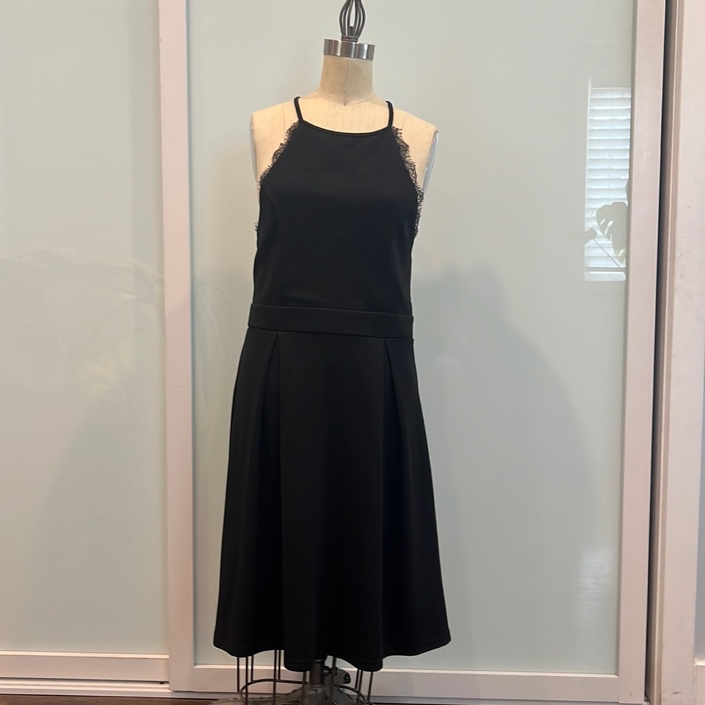 Francesca’s Miami Women’s crepe black dress. Large